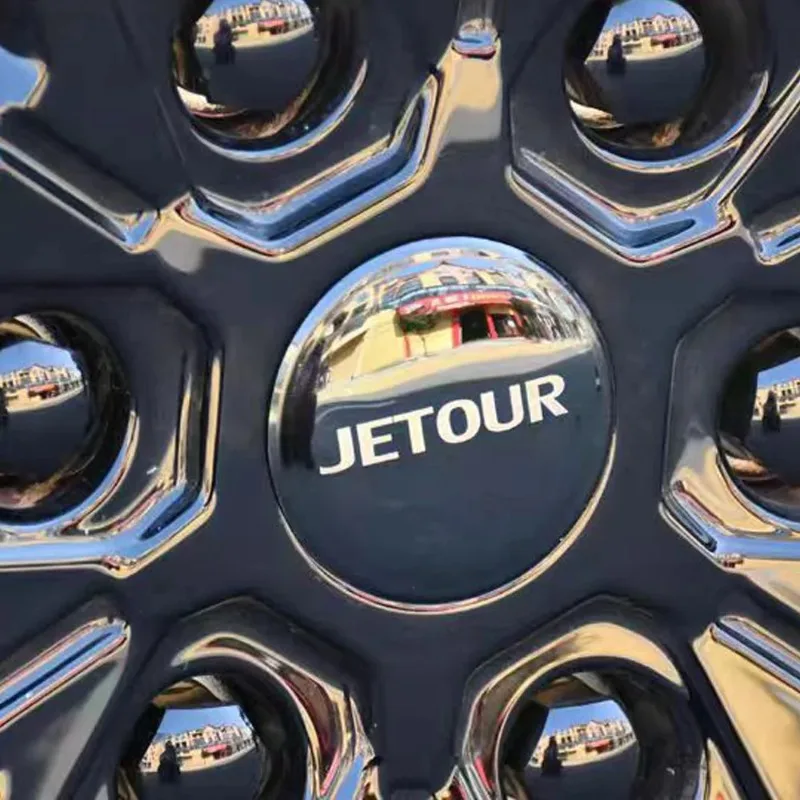 Фото Наклейка на ступицу колеса YUNV для Jetour G700, внешний аксессуар, накладка на центральную часть, черненая. №4