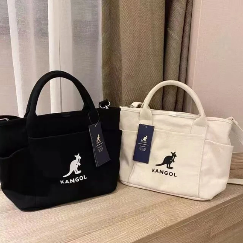 

KANGOL official leisure canvas bag men's and women's portable cross-body dumpling bag ins Korean style everything goes with it