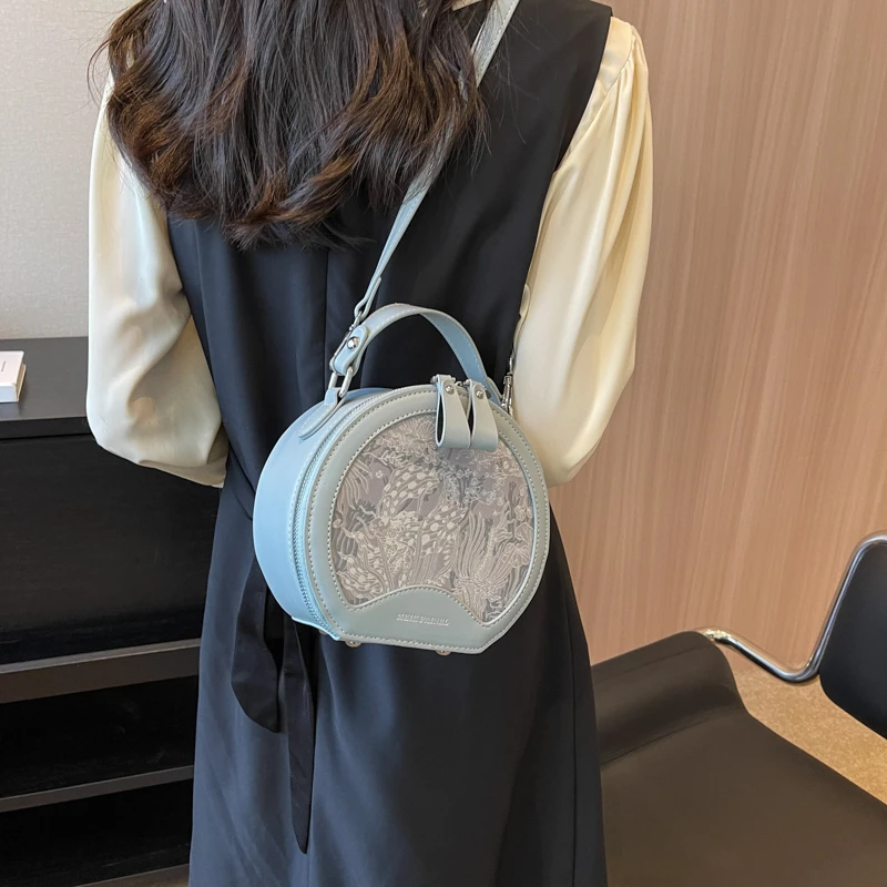 

Advanced Texture Embossed Small Round Bag 2023 New Literary Lady Fashion Shoulder Bag Niche Design Versatile Shoulder Bag M508