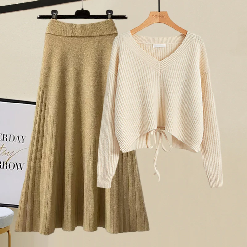 

Autumn and winter women's suit lazy gentle wind new high waist short hollowed out sweater pleated skirt age reduction two sets