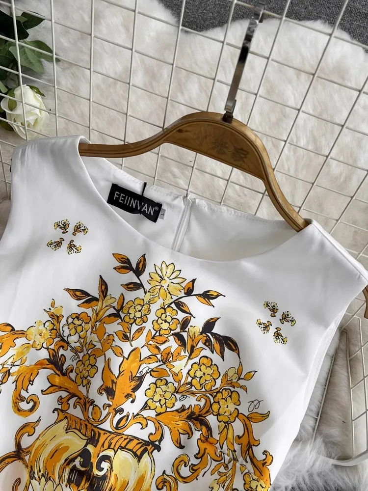 Женское длинное платье средней длины без рукавов с круглым вырезом и цветочным