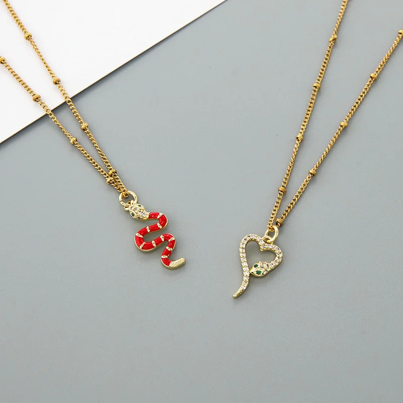 

Premium Gold Plated Necklace Small and Luxury Snake shaped Dropping Oil Pendant Collar Chain Ornament