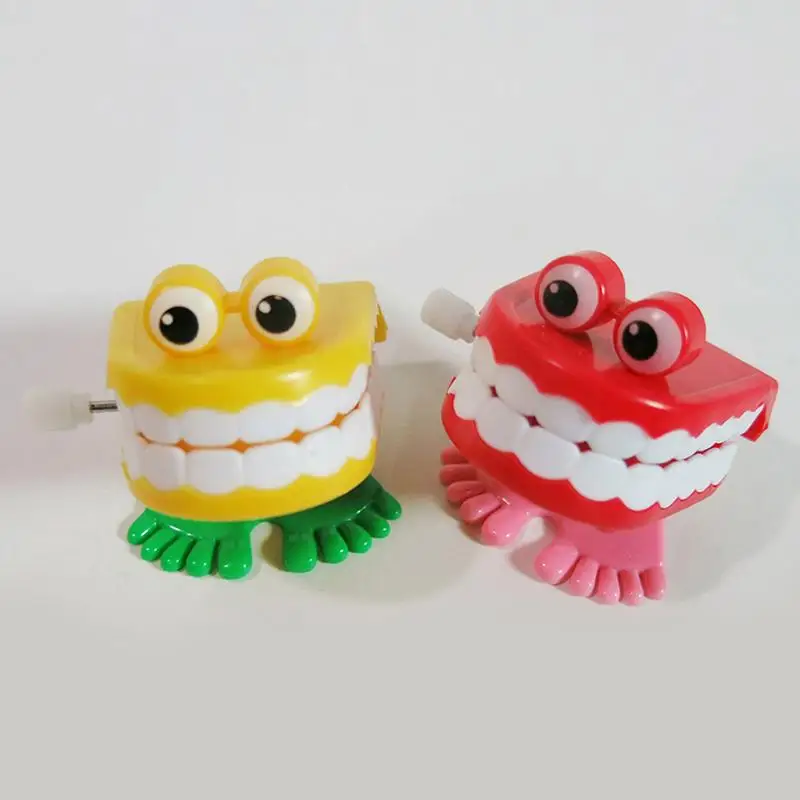 

1pcs Clockwork Toy Upper Chain Jumping Tooth Toy Children Jump Running Wind Clockwork Toy Spring Teeth Up Z0P8