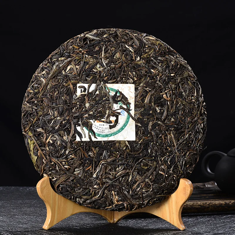 

Puer Golden Peacock Arbor King Spark Pu-erh Cake 2014 357g Ripe