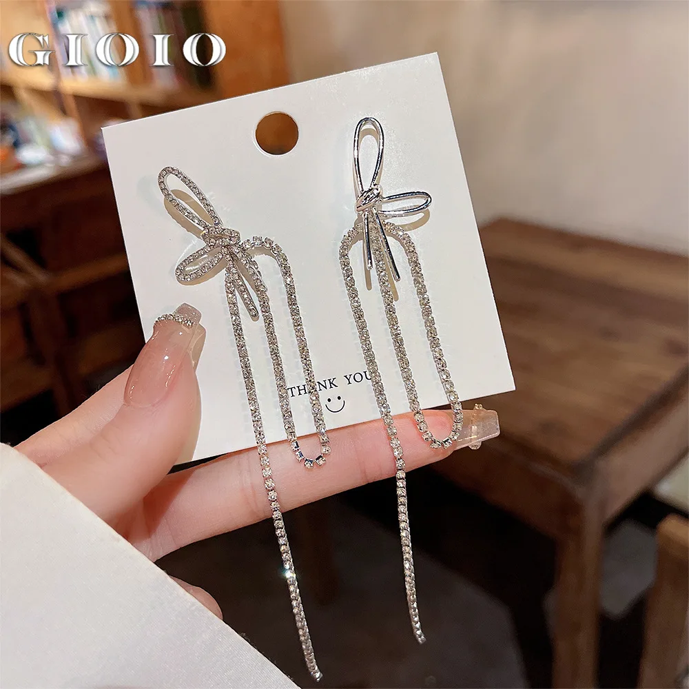 

GIOIO 925 Silver Needle Minority Design Asymmetric Bow Earrings High Sense Celebrities Tassels a Woman with Two Earrings