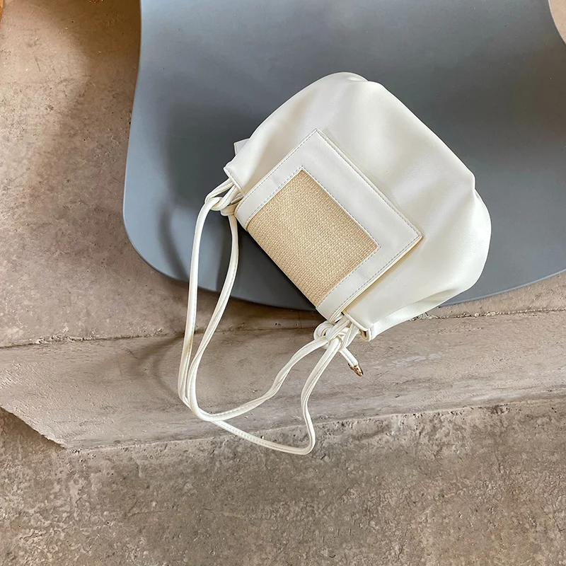

Spring and summer new wrinkled dumplings straw woven bag fashion ins single shoulder oblique span small bag girl