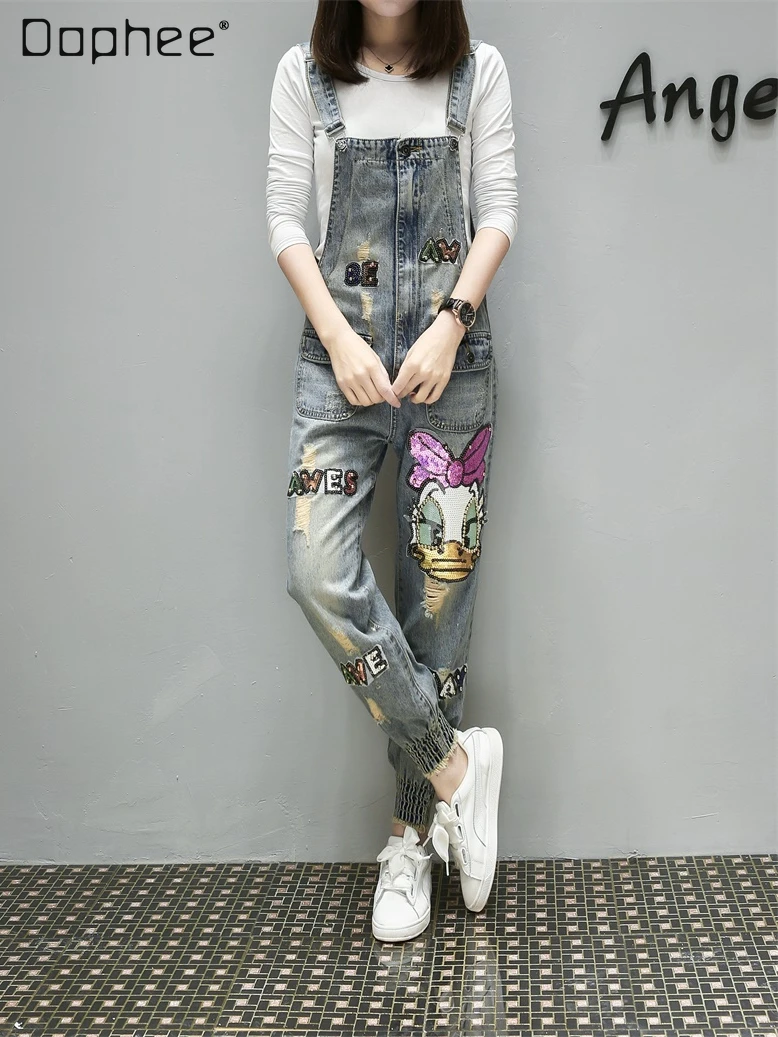 

Fall 2022 New Cartoon Sequin Bead Ripped Light Blue Denim Suspender Pants Women's Loose Casual Distressed Black Harem Pants