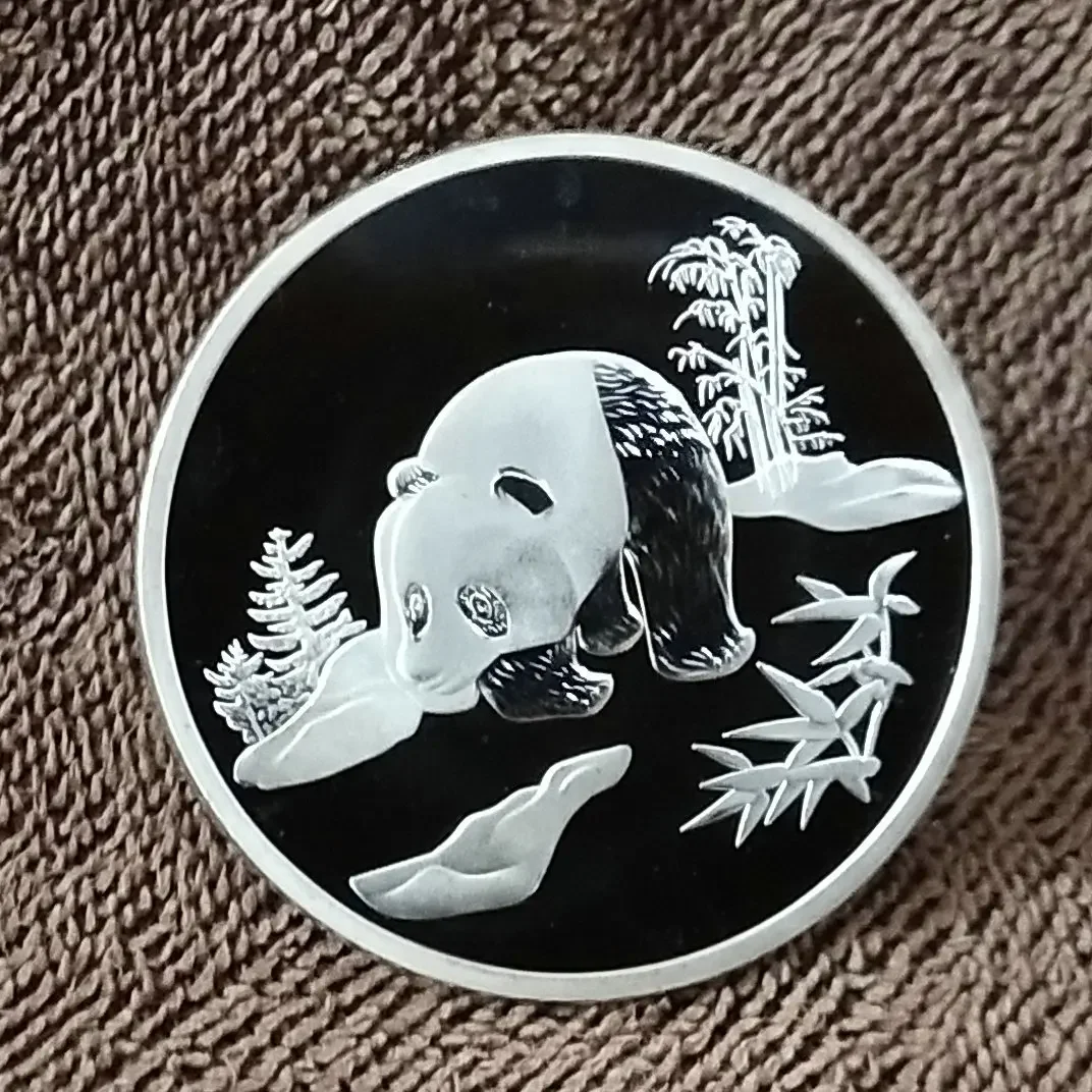 Памятная монета Панда