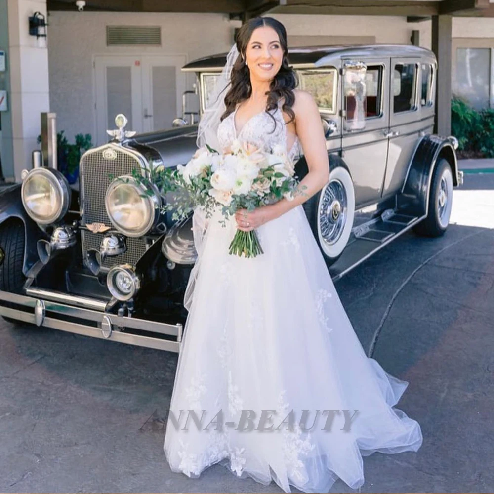 

Anna Classic A Line Sleeveless Wedding Dresses For Bride Appliques V Neck Spaghetti Strap Tulle Bride Gowns Made To Order