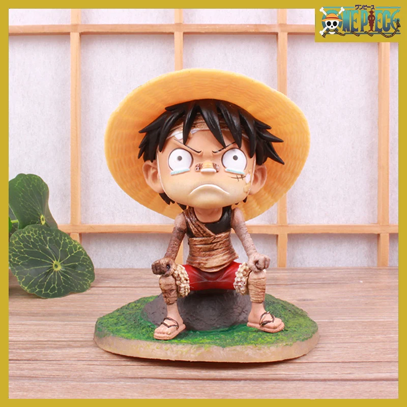 

Anime One Piece New Pattern Bandage Childhood Luffy Action Figure Sitting Injury And Crying Scene Handmade Model Ornaments Gifts