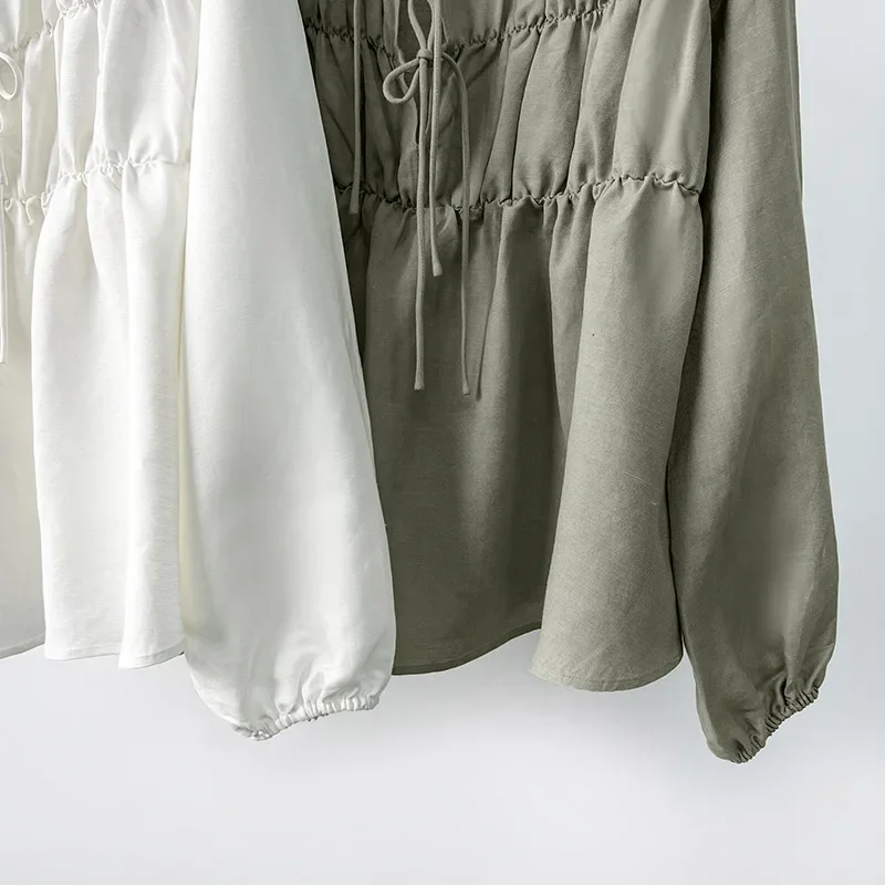 Элегантный женский топ с рукавами-фонариками уменьшающий возраст освежающий