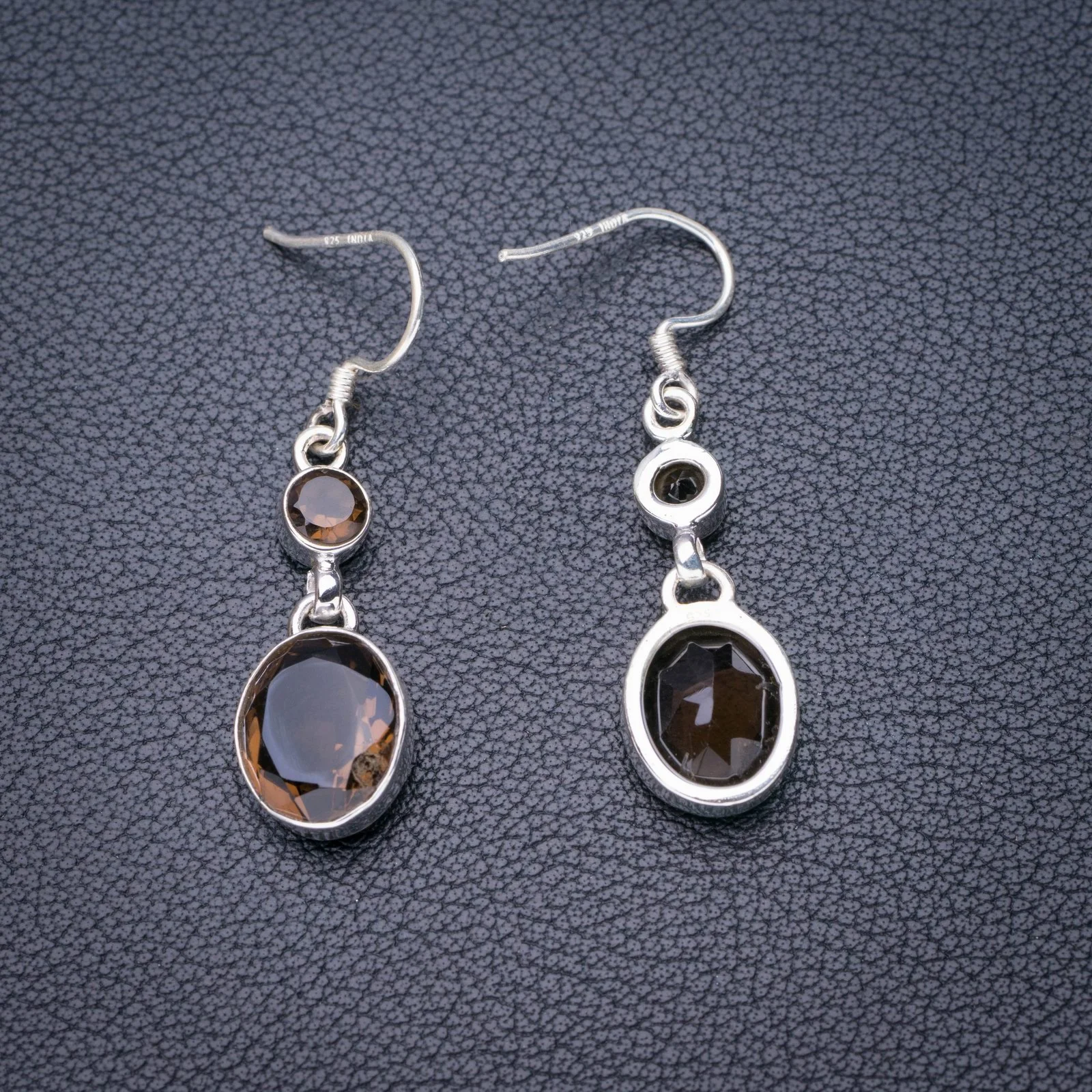 

Серьги из серебра 1,5 пробы с натуральным дымчатым кварцем