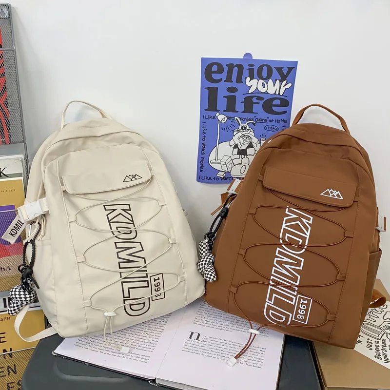 

DIFA Fashion Letter Printing Women Backpack Female Cross Rope Waterproof Nylon Travel Bag Cool Schoolbag for Girl Student Kawaii