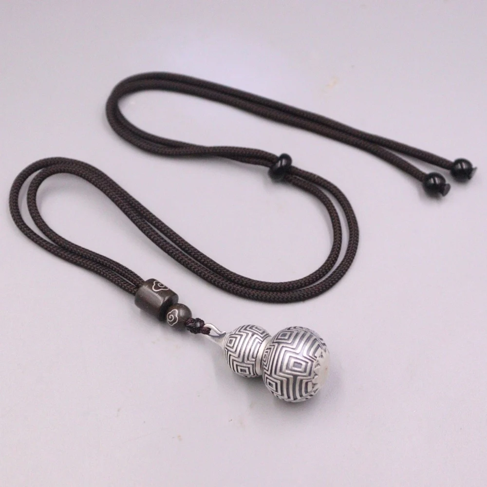 Подвеска в виде тыквы из серебра 999 пробы 14-15 г