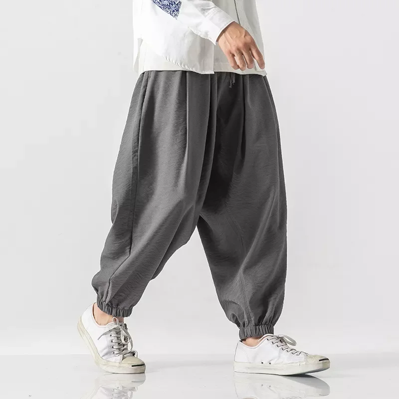 

Брюки мужские мешковатые в стиле Харадзюку, повседневные однотонные штаны, свободные винтажные шаровары, спортивные, большие размеры 5XL, 2020