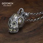 Мужской и женский кулон в виде черепа