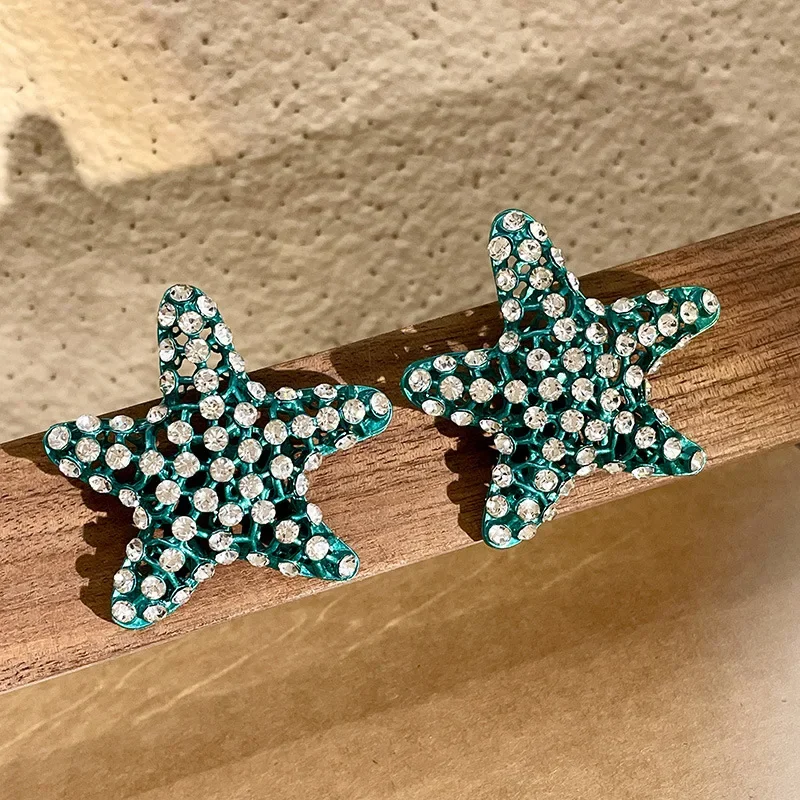 Женские серьги с кристаллами в виде морских звезд