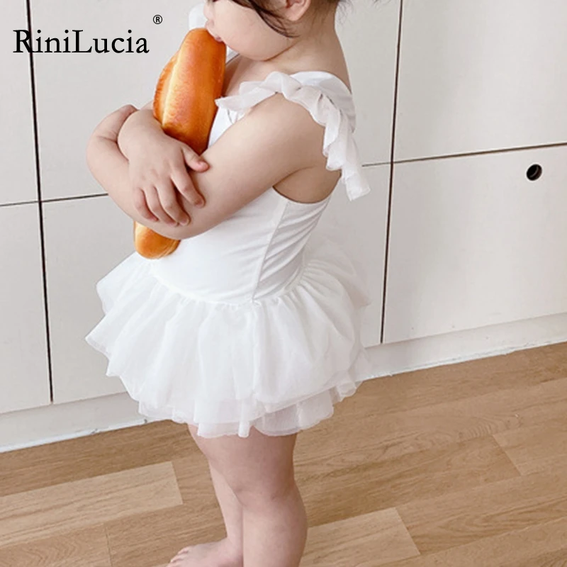 

Купальник Детский слитный из мягкого белого тюля с рукавами-мушками