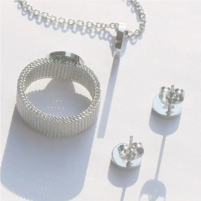 

2023 New Arrived Spain Brand Round Earring Stainless Steel Factory Wholesale High Quality Bear Hollow Simple Silver Color Set