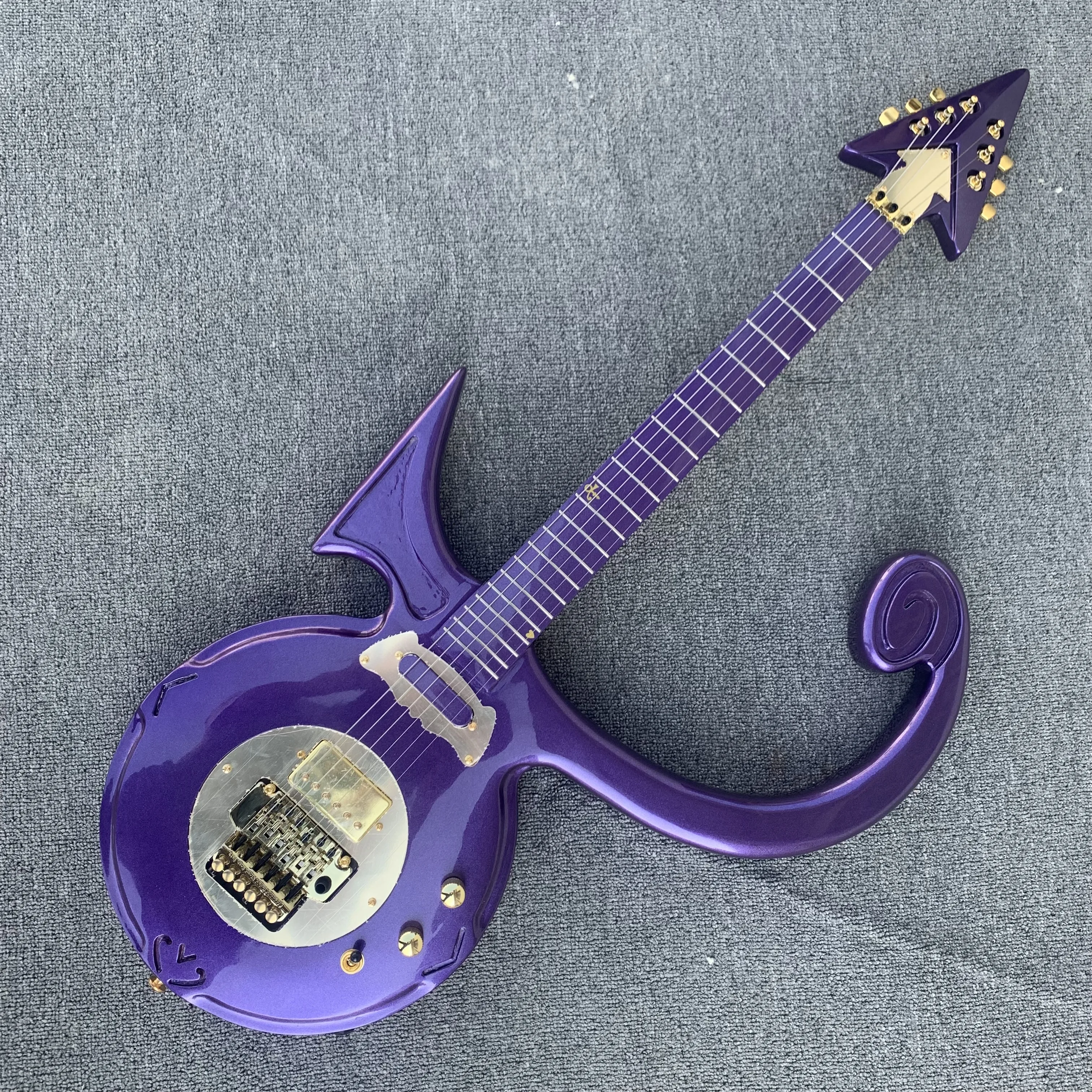 

Rare Shaped Guitar Metallic Purple Rain Prince Symbol Electric Guitar Floyd Rose Tremolo Bridge Gold Hardware Top Selling