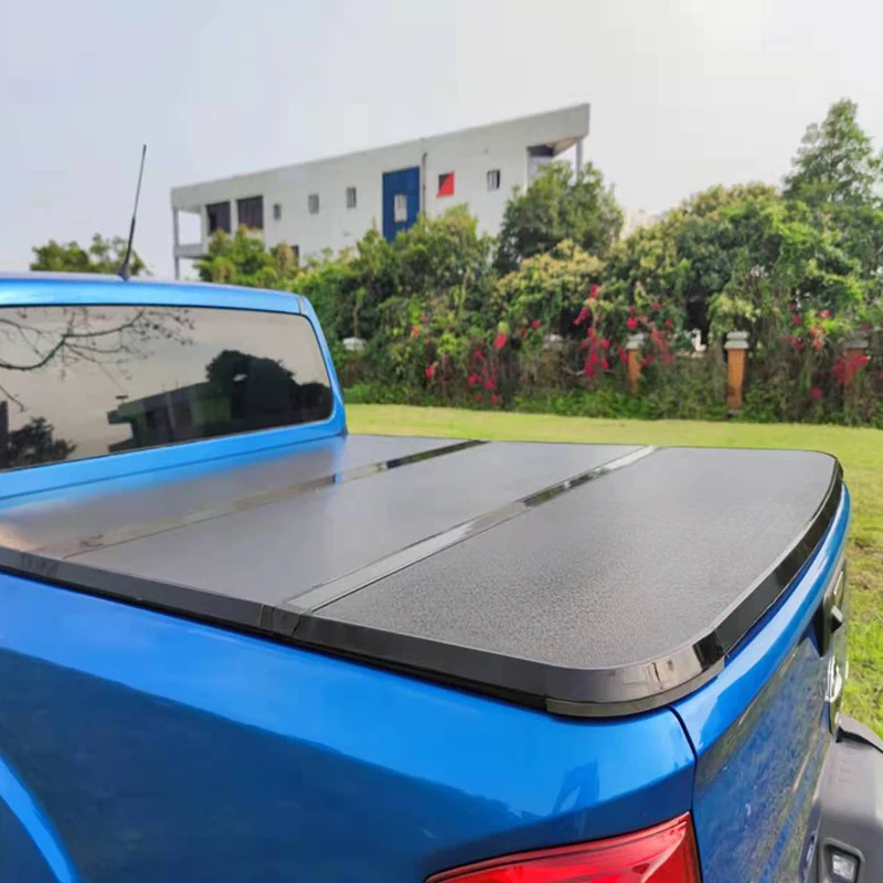 Фото Новая складная жесткая крышка-роллер для кузова Toyota Hilux Rocco 2018 и Tundra 2014 №2