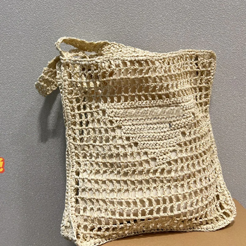 

P home straw woven Tote Bag Lafite grass beach bag woven armpit bag hollow knitted one shoulder portable shopping bag female