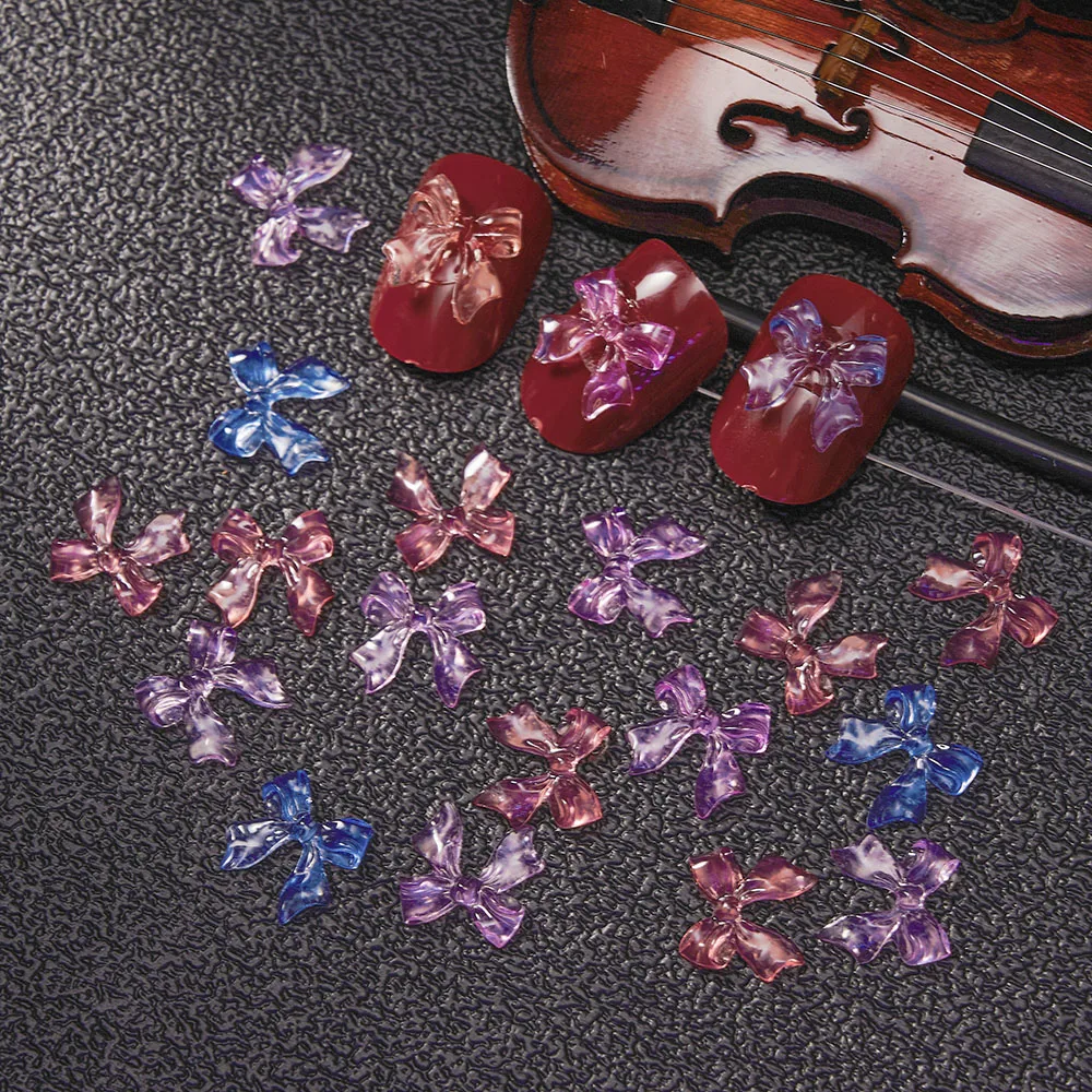 

100pcs/Lot Color-Changing Butterfly Parts Change IN UV 3D Nail Art Bow Charms Resin Clear Rhinstones Accessories Ribbon Charm