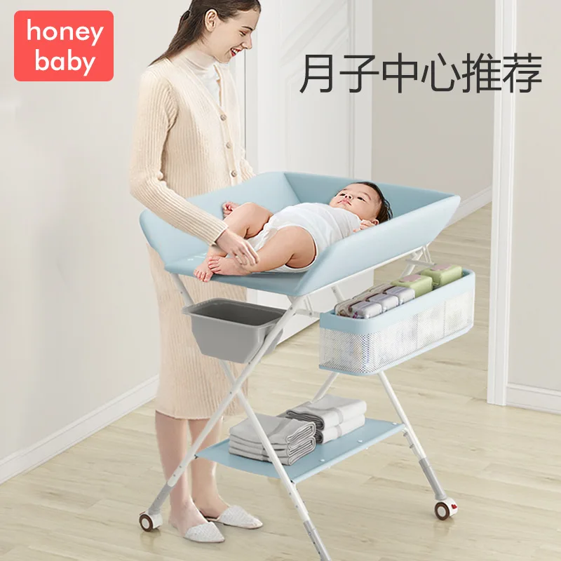 The new multifunctional folding high and low can adjust the newborn baby care table, changing diaper table, bathing table