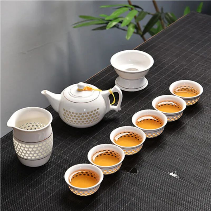 

Сине-белый изысканный керамический чайный горшок чайный стакан чайный набор с вырезами китайский чайный набор посуда для напитков чайная ц...