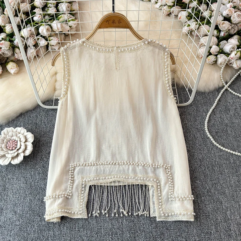 Женская свободная кофта без рукавов с круглым вырезом и бриллиантами