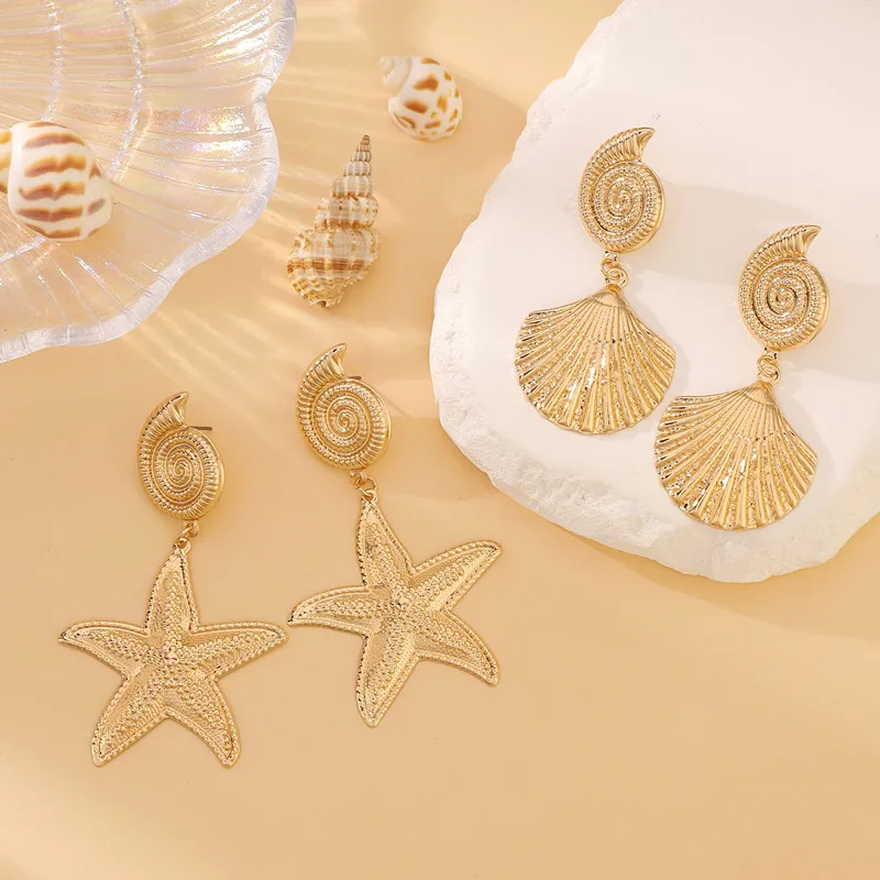 Женские серьги в виде ракушек и морских звезд