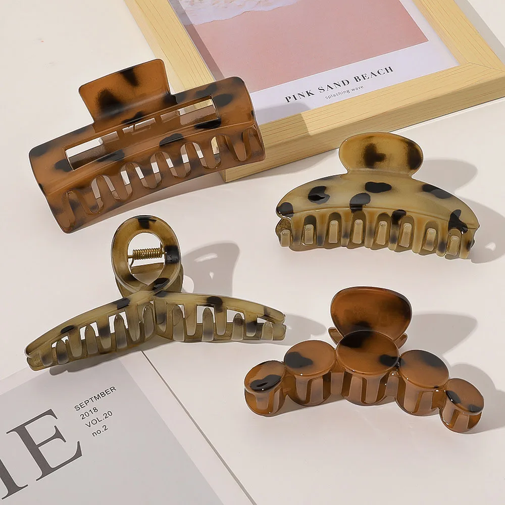 

Women's Acetate Hair Claw Crab Simple Hollow Geometric Printing Hairpin Hair Catch Large Grasping Clip Girls Hair Accessories