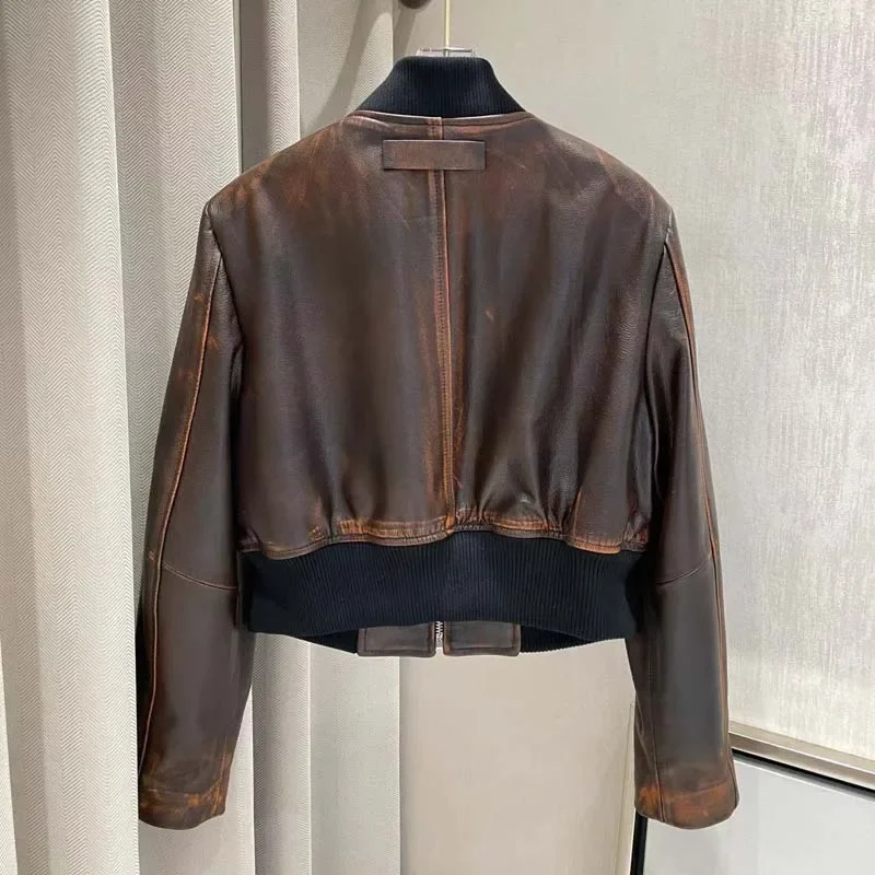 Женское демисезонное пальто из натуральной овчины с круглым вырезом