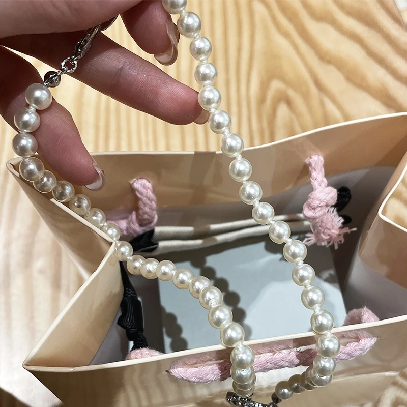 

Logo Craved Saturn Pendant 1 layer Ice Cream Color Pearl Necklace High Quality Necklace Ins Hot