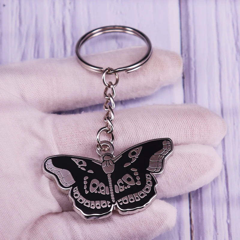 

Harry-Styles keyring Inspired Butterfly Tattoo Keychain