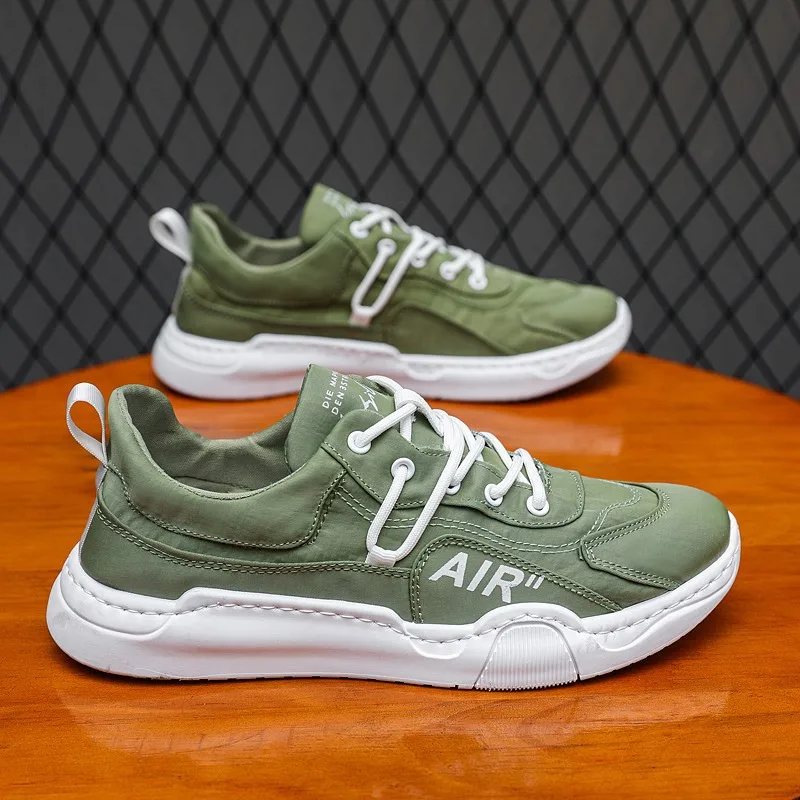 

New Men Sneakers for Man Fashion Spring Summer Breathable Fabric Street Cool White Casual Sport Shoes Trend Loafers 4 Colors