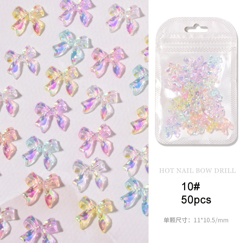 

50pcs Aurora crystal bow ornaments for nail art decoration fashion design mix rainbow color DIY manicure nail rhinestones HZ008