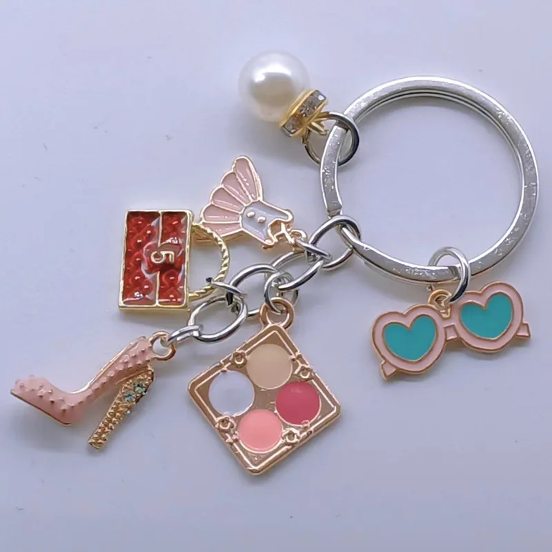 Новый брелок-подвеска Шарм Восхитительная мода Стразы Высокие каблуки Сумка Юбка Косметический чехол Очки Аксессуары Дамские украшения.