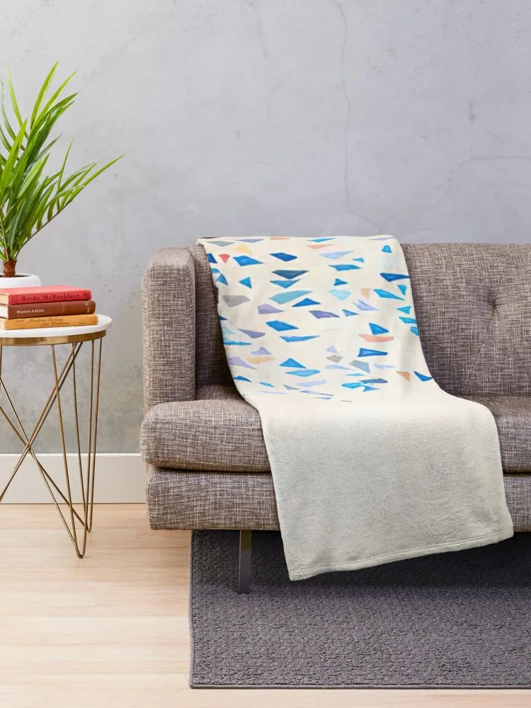 Цветные формы - Одеяло Robert Goodnough в клетку на диване. Свободные одеяла.