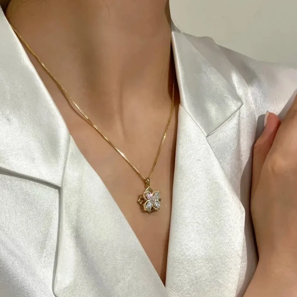 S925 Серебряное вращающееся ожерелье с четырьмя листьями и маленьким цветком