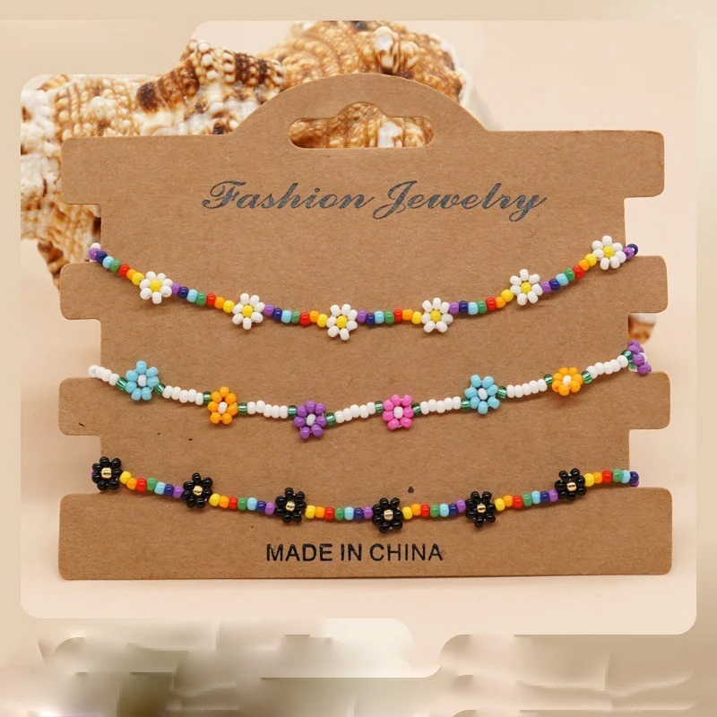 

Fashion Crystal Daisy Flower Bracelet for Women Simple Hand Woven Chain Rice Bead Bracelet 7 Floras Pendant Jewelry Party Gift