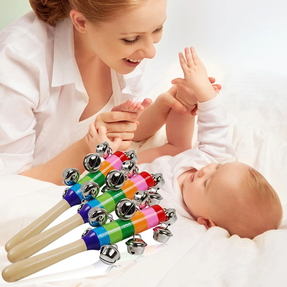 

Cute Rainbow Baby Toy Pram Crib Handle Wooden Bell Stick Shaker Rattle