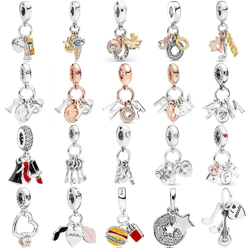 

Подвеска из серебра 925 пробы в виде тройного монограмма с перьями