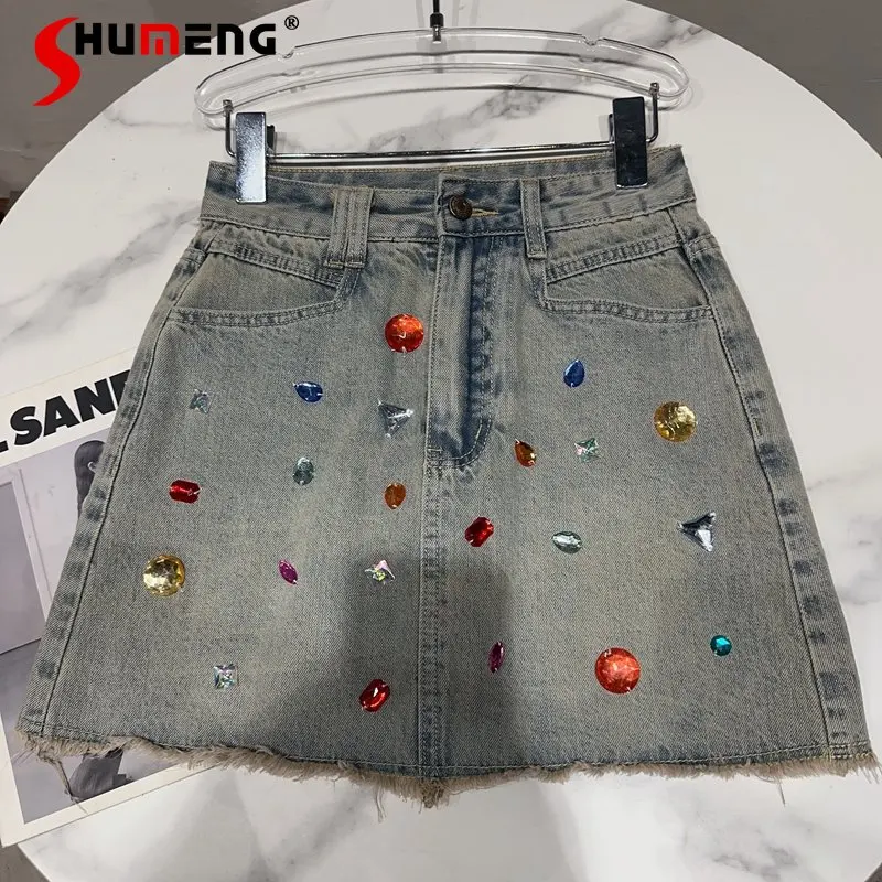 

Women's Short Denim Skirt 2023 Summer New Style Cool Colored Gem Beaded Washed and Worn Denim Package A-line Hip Skirt Tide