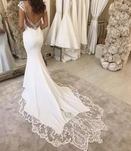 2022 Luxury Lace Appliques Mermaid Wedding Dresses Sexy Deep V-neck Backless Bridal Gowns Cap Sleeves Long Train Custom Made