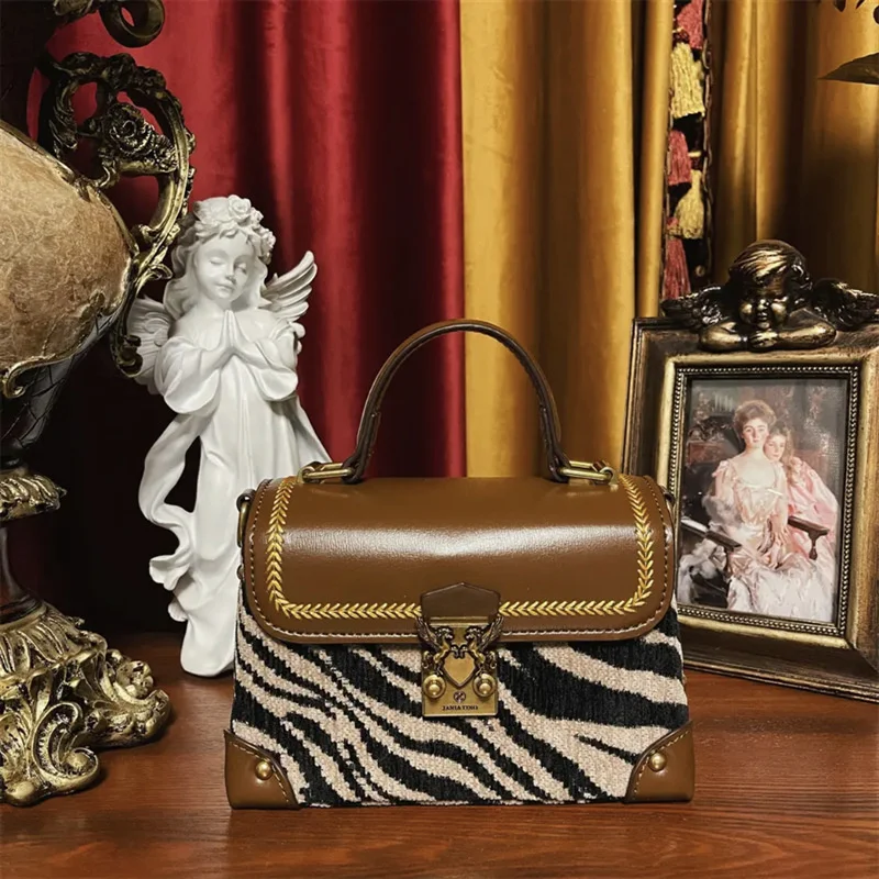 

high quality luxury brand JANITINO Small Spike Zebra Stripe Box Buckle Women 2023 New One Shoulder Crossbody Bag
