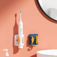 2021 new gravity sensor electric toothbrush holder creativity no trace bracket wall mounted save space bathroom accessories