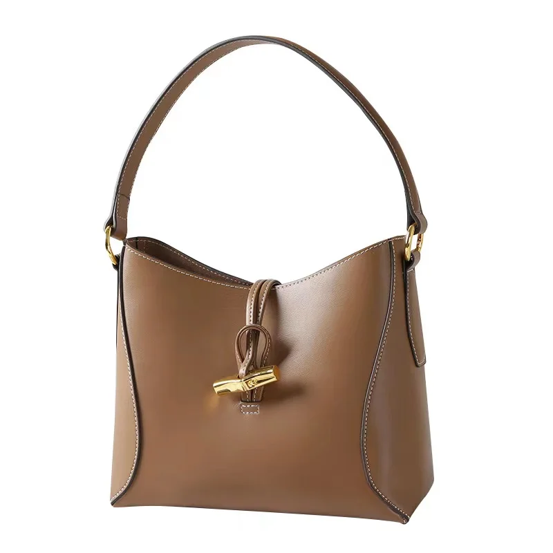 

Women's Hand-Held Bucket Bag 2022 New Spring And Summer Cowhide Messenger Handbag Female Niche Advanced Shoulder Commuter Pack