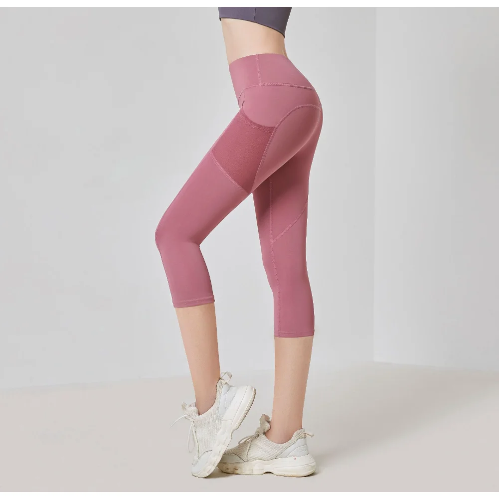 

Solid Color Hip Lift Yoga Pants Female Mesh Pocket High Waist Seven-point Pants Bottoming Pants Sports and Fitness Leggings