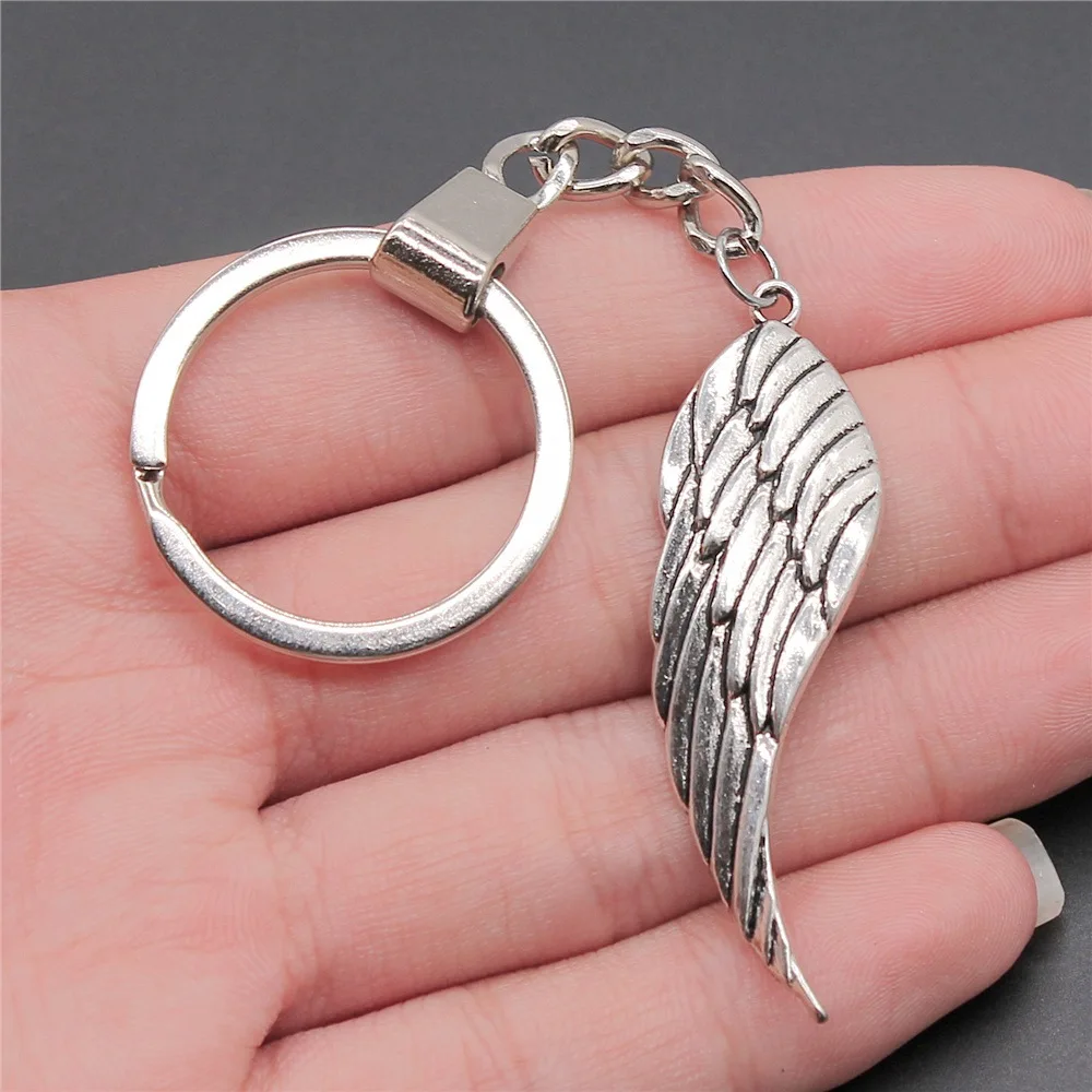 

Прямая поставка, брелок с подвеской в виде крыла ангела, серебристого цвета, 52x15 мм, сувениры, подарок